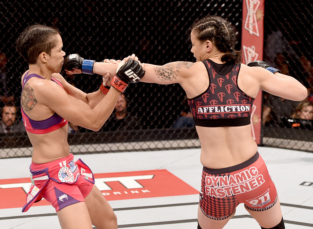 RIO DE JANEIRO, BRAZIL - MARCH 21: Shayna Baszler of the United States punches Amanda Nunes of Brazil in their bantamweight bout during the UFC Fight Night at Maracanazinho Gymnasium on March 21, 2015 in Rio de Janeiro, Brazil. (Photo by Buda Mendes/Zuffa LLC/Zuffa LLC via Getty Images) RIO DE JANEIRO, BRAZIL - MARCH 21: Shayna Baszler of the United States punches Amanda Nunes of Brazil in their bantamweight bout during the UFC Fight Night at Maracanazinho Gymnasium on March 21, 2015 in Rio de Janeiro, Brazil. (Photo by Buda Mendes/Zuffa LLC/Zuffa LLC via Getty Images)