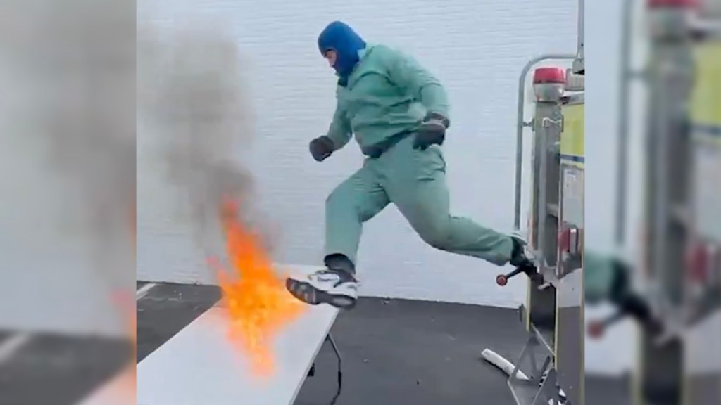Jason Kelce Jumps Through A Flaming Table