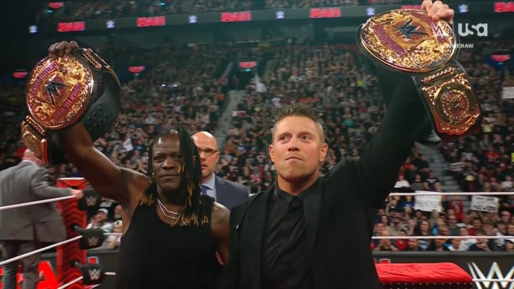 Triple H Unveils New World Tag Team Titles On 4/15 WWE RAW