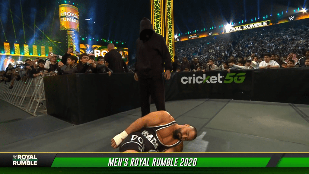 Triple H Teases Identity Of Masked Man at WWE Royal Rumble