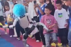 robot kicks child