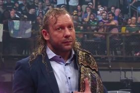 Kenny Omega with AEW World title at Dynamite