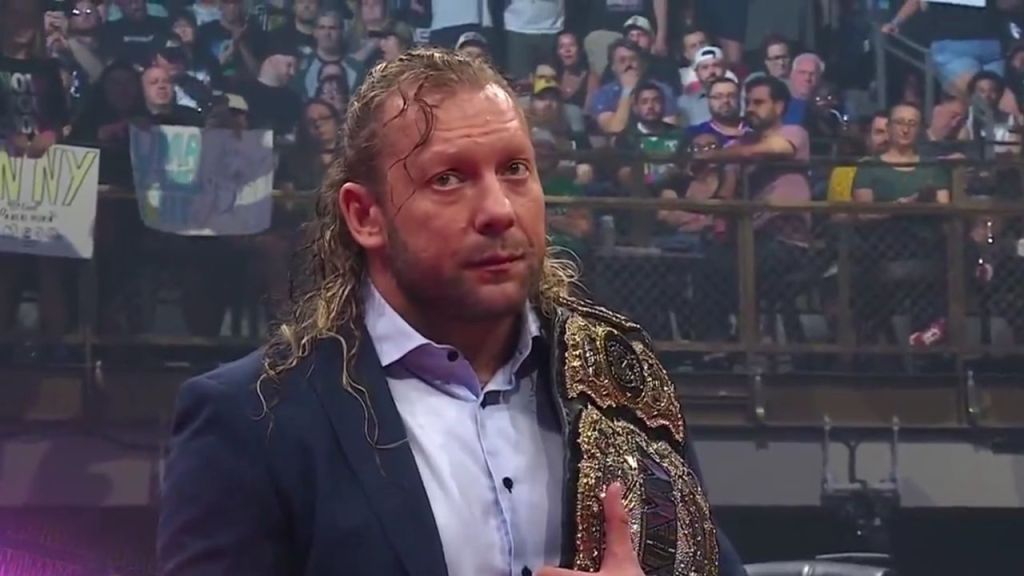 Kenny Omega with AEW World title at Dynamite